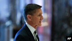 Retired Lt. Gen Michael Flynn walks through the lobby at Trump Tower, Nov. 17, 2016, in New York. The former head of the Defense Intelligence Agency has been appointed Trump's national security adviser.