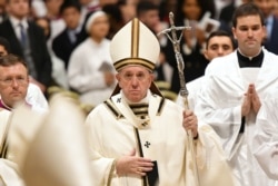 Pope Francis leads a Christmas Eve mass in St Peter's Basilica to mark the nativity of Jesus Christ, Dec. 24, 2019, at the Vatican.
