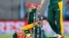 South Africa's AB de Villiers falls over as he attempts a run out during their Cricket World Cup semifinal against New Zealand in Auckland, New Zealand, Tuesday, March 24, 2015. (AP Photo/David Rowland)