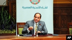 FILE - Egyptian President Abdel-Fattah el-Sissi, speaks during a live broadcast, in Cairo, Egypt, April 13, 2016. 