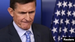 FILE - National security adviser General Michael Flynn arrives to deliver a statement during the daily briefing at the White House in Washington, Feb. 1, 2017.