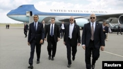 Presiden Obama dikawal pawalpres saat kunjungan ke Tampa, Florida (13/4). Beberapa anggota paswalpres diduga 'berkelakuan buruk' di Kolombia.