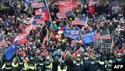 Trump supporters clash with police and security forces as they storm the U.S. Capitol in Washington, Jan. 6, 2021.