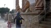FILE - Worshipers enter a branch of La Luz del Mundo church in LA. California's top prosecutor believes there are more victims of child sex abuse than those listed in charges against Mexico-based megachurch leader La Luz del Mundo and several followers. 
