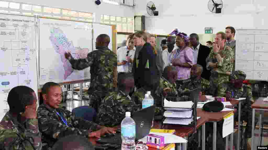 U.S. Ambassador to the United Nations Samantha Power, center, visits the Western Area Emergency Response Centre in Freetown, Sierra Leone, Oct. 27, 2014.