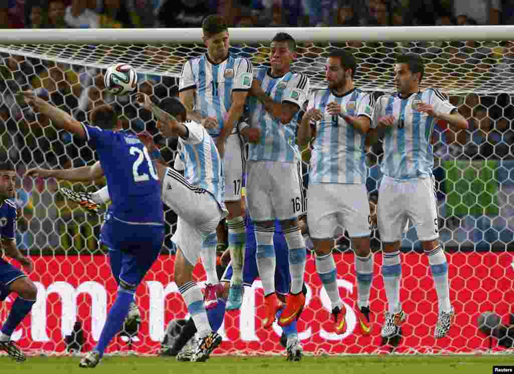 Bosnia's Izet Hajrovic takes a free kick during the 2014 World Cup Group F soccer match against Argentina at the Maracana stadium, in Rio de Janeiro, June 15, 2014.