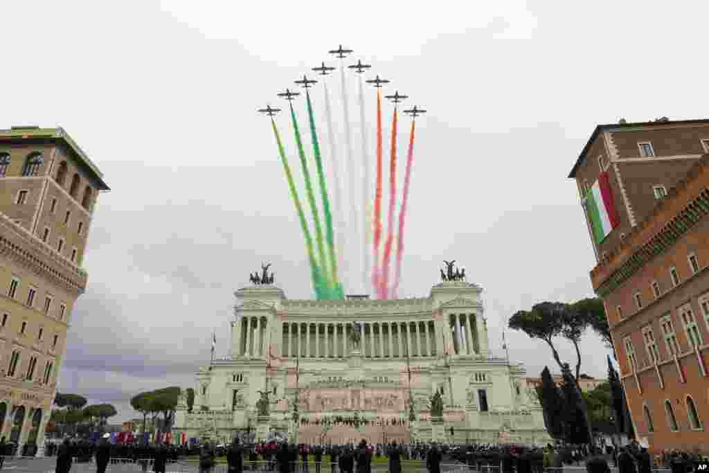 Italian Airforce acrobatic squad "Frecce Tricolori" flies above the Monument of the Unknown Soldier in Piazza Venezia Square, in Rome, on the occasion of the Italian Armed Forces Day.