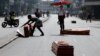 At Nairobi morgue, families of protesters collect their loved ones