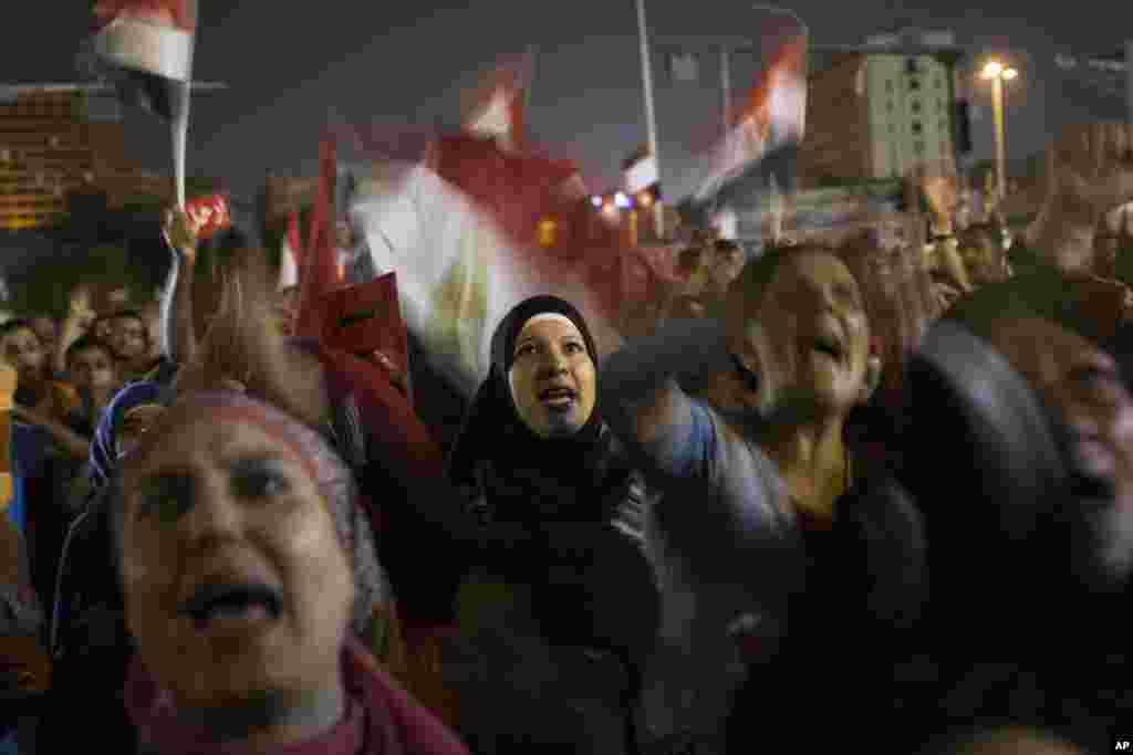 Egyptian women chant slogans against President Mohamed Morsi during a demonstration in Tahrir Square in Cairo, June 27, 2013.