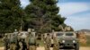 Tentara Israel berkumpul di Dataran Tinggi Golan yang dicaplok Israel, di perbatasan dengan Suriah, 27 Februari 2020. (Foto: AFP)