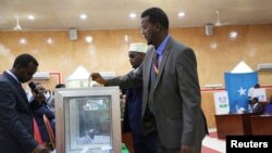 FILE - A member of parliament for the semiautonomous region of Puntland casts his vote in Puntland's presidential election in Garowe, Puntland state, northeastern Somalia, Jan. 8, 2019.