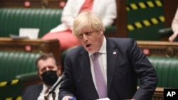 資料照：英國首相約翰遜在議會下議院發言。