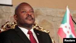 FILE - Burundi's President Pierre Nkurunziza attends the opening of a coffee conference in the capital, Bujumbura, Feb. 13, 2014. 