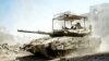 Fotografi e publikuar nga ushtria izraelite më 1 korrik, 2024, tregon një tank izraelit gjatë operacionit në Gazë/Ushtria izraelite përmes AFP 
