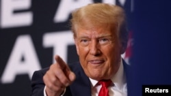 Antigo Presidente americano Donald Trump em campanha em Waterloo, Iowa
