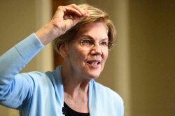 FILE - Democratic presidential candidate Elizabeth Warren speaks during an interview with The Associated Press in Charleston, S.C., Dec. 8, 2019.