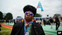 Supporters of Congolese President elect Felix Tshisekedi gather at the Palais de la Nation for his inauguration in Kinshasa, Democratic Republic of the Congo, Thursday Jan. 24, 2019. 