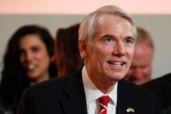 FILE - Sen. Rob Portman, R-Ohio, attends a ceremony at the Ohio Statehouse, in Columbus, Ohio, Jan. 14, 2019.