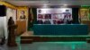 བོད་ནང་རྒྱ་ནག་གཞུང་གི་བཙོན་འོག་ཏུ་ཚུད་པའི་རྩོམ་པ་པོའི་སྐོར་གྱི་སྙན་ཐོ།