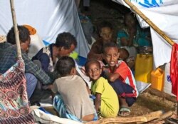 Ethiopian refugees who fled fighting in Tigray province are pictured at the Um Rakuba camp in Sudan's eastern Gedaref province, Nov. 19, 2020.