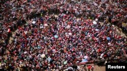Protesters opposing Egyptian President Mohamed Morsi demande his resignation in Tahrir Square, Cairo, July 2, 2013. 