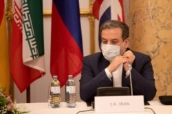 FILE - Iran's top nuclear negotiator, Abbas Araqchi, attends a meeting of the JCPOA Joint Commission in Vienna, Austria, Sept. 1, 2020. (EEAS/Handout via Reuters)
