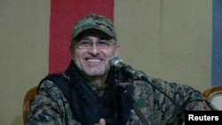 FILE - Top Hezbollah commander Mustafa Badreddine is seen in this handout picture released by Hezbollah Media office on May 13, 2016. 