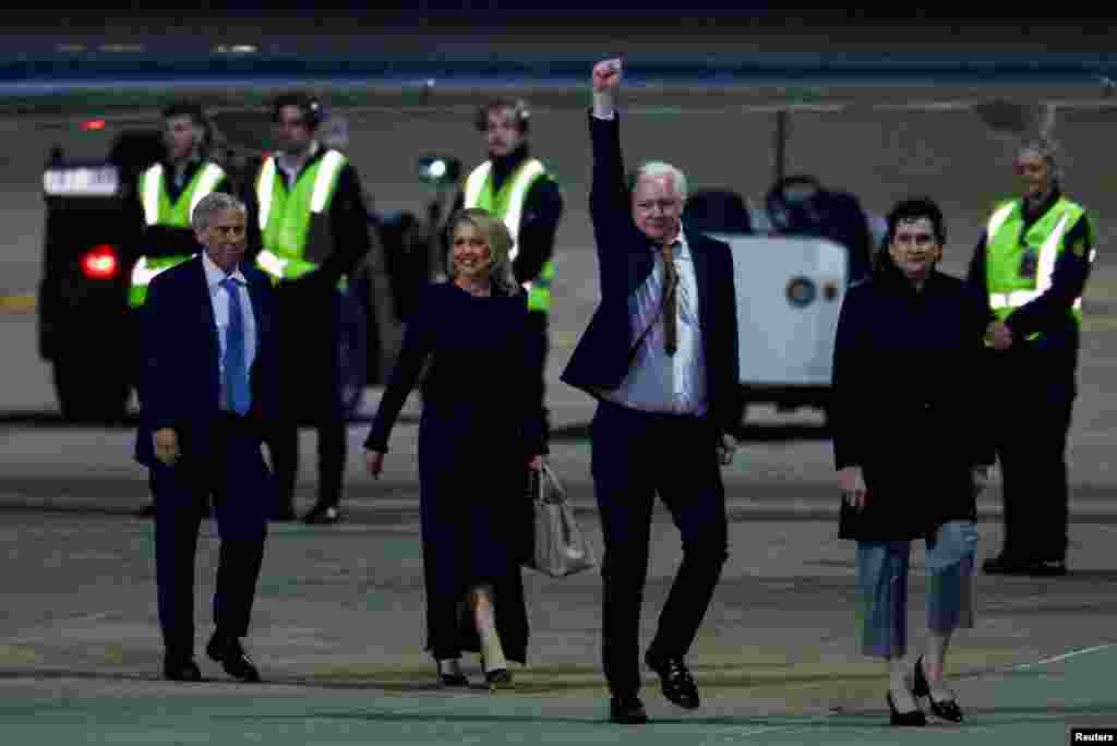 WikiLeaks founder Julian Assange gestures as he arrives in Canberra, Australia, June 26, 2024. Assange was released by a court on the U.S. Pacific island territory of Saipan after pleading guilty to violating U.S. espionage law.