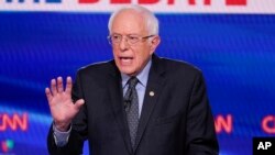 FILE - Sen. Bernie Sanders participates in a Democratic presidential primary debate at CNN Studios in Washington, March 15, 2020.