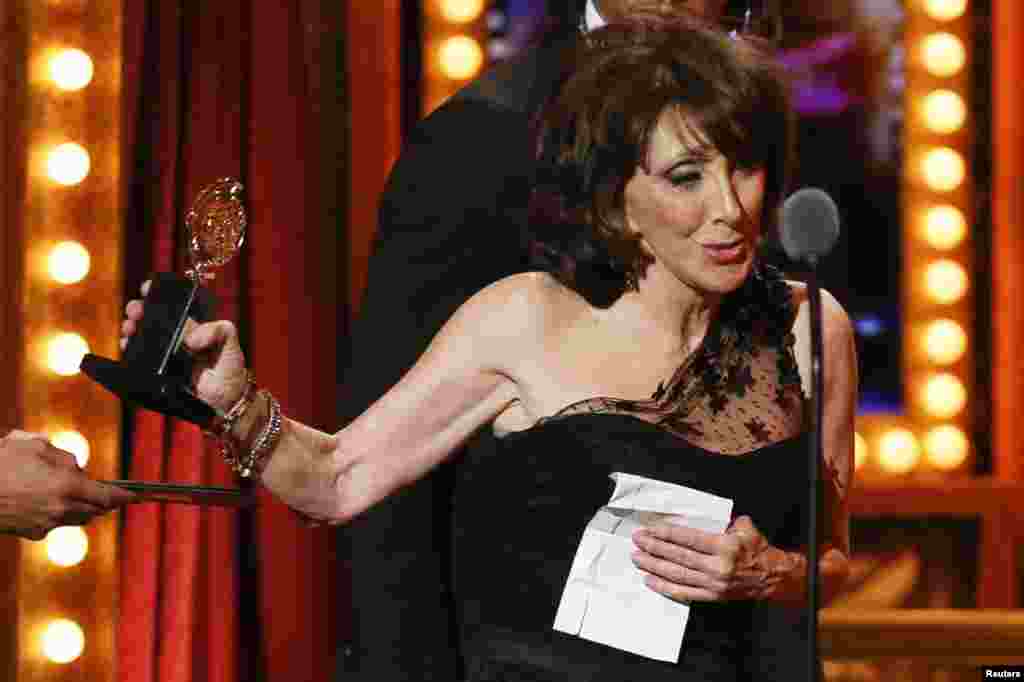 Actress Andrea Martin accepts the award for Best Performance by an Actress in a Featured Role in a Musical for "Pippin" during the Tony Awards in New York, June 9, 2013.