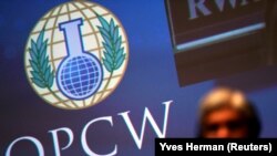 NETHERLANDS -- The logo of the Organization for the Prohibition of Chemical Weapons (OPCW) is seen during a special session in the Hague, Netherlands June 26, 2018