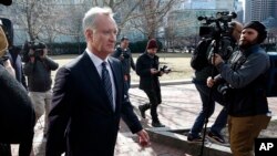 FILE - TobyMacFarlane departs federal court in Boston after facing charges in a nationwide college admissions bribery scandal, April 3, 2019.