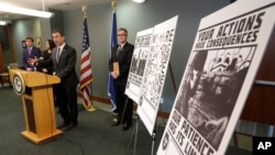 Raymond Duda, FBI Special Agent in Seattle, speaks during a news conference, Feb. 26, 2020, about charges against a group of alleged members of the neo-Nazi group Atomwaffen Division for cyber-stalking and mailing threatening communications.