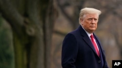 Arhiva - Predsjednik Donald Trump na južnom travnjaku Bijele kuće u Washingtonu, 12. decembra 2020.