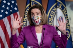 Speaker of the House Nancy Pelosi, D-Calif., holds a news conference on the day after violent protesters loyal to President Donald Trump stormed the U.S. Congress, at the Capitol in Washington, Jan. 7, 2021.