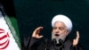 Iranian President Hassan Rouhani speaks during a ceremony celebrating the 41st anniversary of the Islamic Revolution, at Azadi (Freedom) Square in Tehran, Iran, Feb. 11, 2020.