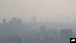Air pollution blankets the skyline in Tehran, Iran, Nov. 30, 2019. 
