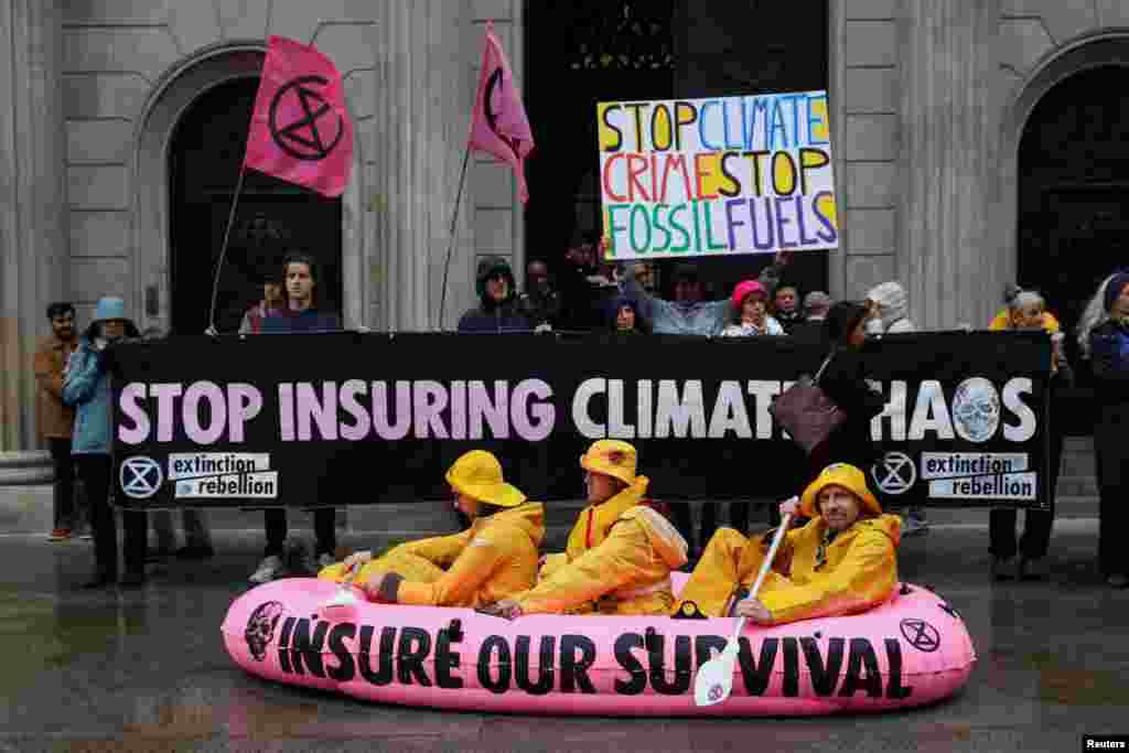 Extinction Rebellion activists protest near the Bank of England, in London, Oct. 28, 2024.