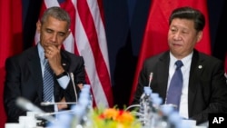 美国总统奥巴马和中国主席习近平在联合国气候大会上（2015年11月30日）