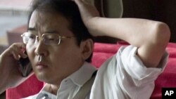 FILE - Attorney Xia Lin, pictured on July 14, 2011, was sentenced to 12 years in prison, Sept. 22, 2016, on fraud charges in what observers said was thought to be the harshest penalty rendered in years against those few willing to take on the ruling Communist Party.