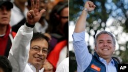 FILE - This combination of two file photos shows Colombian presidential candidates Gustavo Petro, left, and Ivan Duque, both in Bogota, Colombia. Colombian voters head to the polls May 27, 2018. For the first time in Colombia’s recent history voters are focused on issues like corruption, the economy and their weariness with establishment politicians, rather than war.