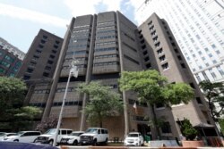 This July 1, 2019 photo shows the Manhattan Correctional Center, in New York. Financier Jeffrey Epstein died by suicide while awaiting trial on sex-trafficking charges in New York, a former law enforcement official said Saturday.