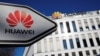 FILE - The logo of Huawei Technologies is pictured in front of the German headquarters of the Chinese telecommunications giant in Duesseldorf, Germany, Feb. 18, 2019. 