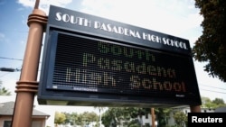 A sign is seen outside South Pasadena High School in South Pasadena, California, August 19, 2014.