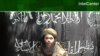 FILE - This handout photo provided by IntelCenter shows a video frame of Abdelmalek Droukdel, al-Qaida's North Africa chief, broadcast by Al Jazeera on May 8, 2007. France said that its troops and allied forces killed Droukdel on June 3, 2020, in Mali.