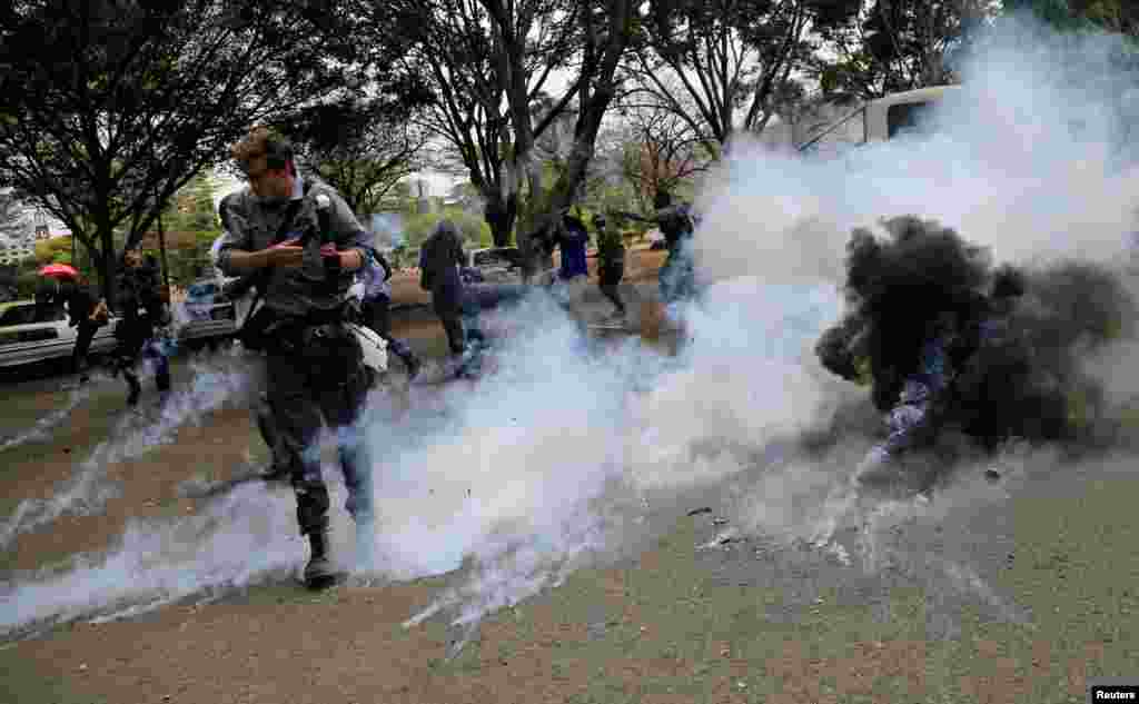 A tear-gas canister is fired toward journalists covering anti-corruption protest opposing the graft and abuse of funds in public healthcare, during a demonstration in Kenya's capital Nairobi.