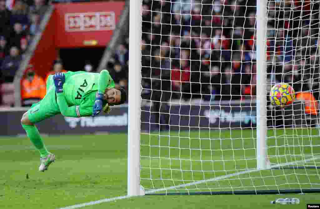 Southampton's James Ward-Prowse scores their first goal past Tottenham Hotspur's Hugo Lloris, at St. Mary's Stadium, in Southampton, Britain.
