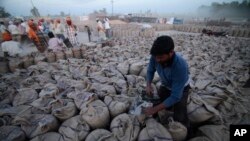 Harga gandum di India anjlok setelah pemerintah melarang ekspor gandum untuk mengamankan pasokan gandum di dalam negeri di tengah perang di Ukraina (foto: dok). 